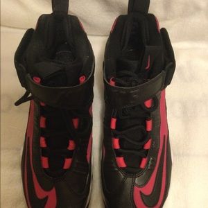 Nike Tennis shoes pink,black, and white.  Gently used a few times. No Odors